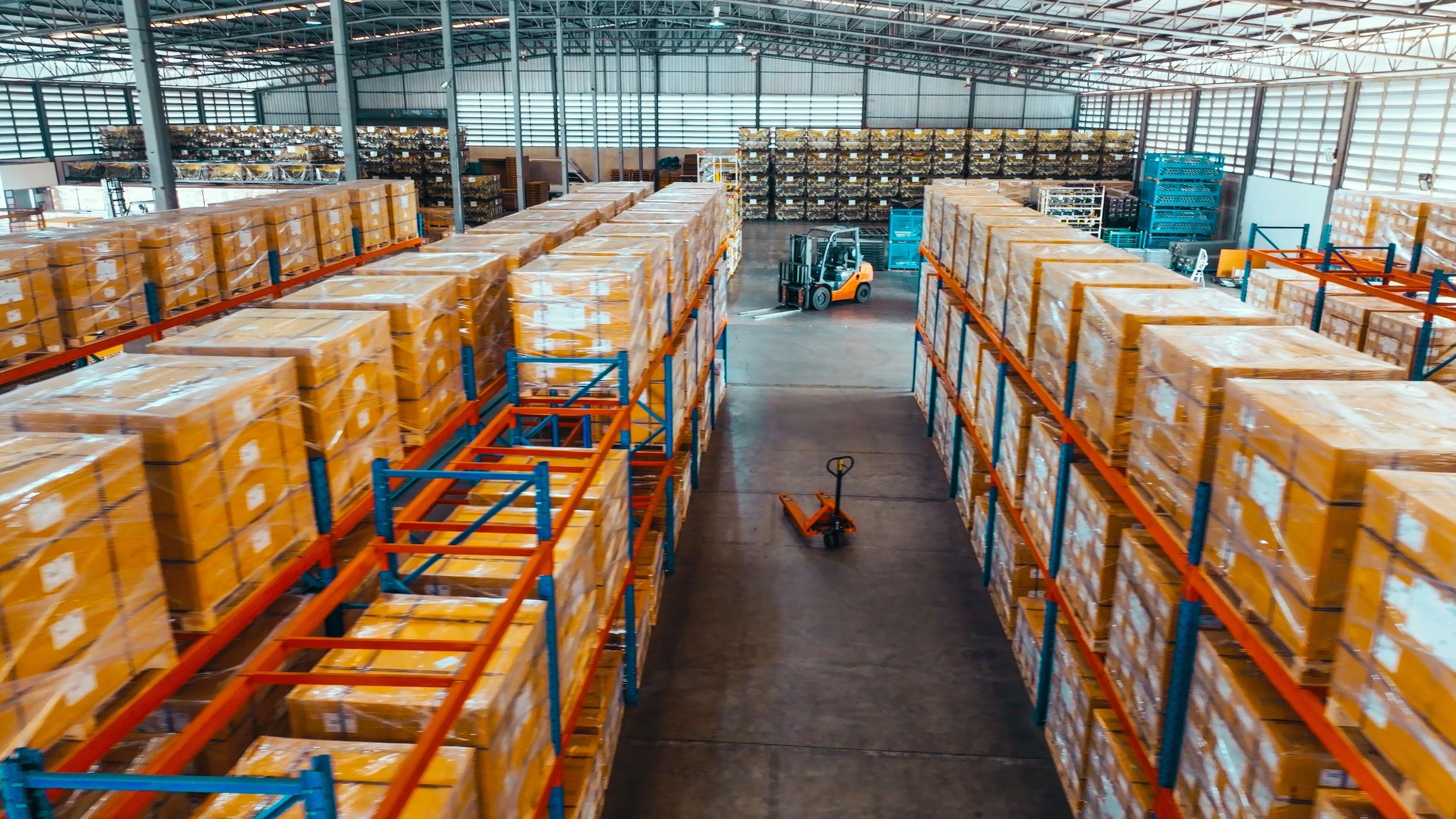 Warehouse shelves with packed shipping boxes ready for fulfillment